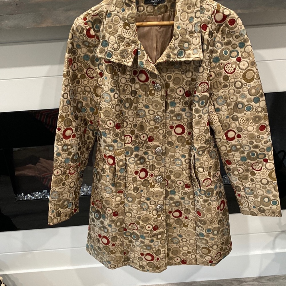 Ladies fall jacket. Multi colour earth tone colours.